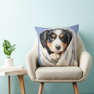 BERNER BERNER HOND PUPPY ONDER DEKEN KUSSEN