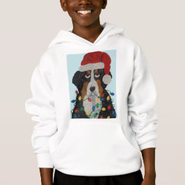 Berner Sennenhond in kerstverlichting verward