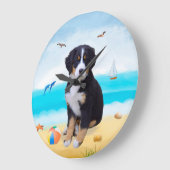 Berner Sennenhond op het strand Grote Klok (Hoek)