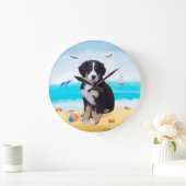 Berner Sennenhond op het strand Grote Klok (Huis)