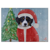 Bernese Mountain Dog in sneeuw met kerstcadeaus Snijplank (Voorkant)
