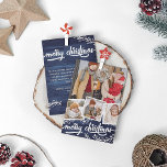 Berry Twig Blue Wood Foto Collage Kerst Feestdagenkaart<br><div class="desc">Dubbelzijdige kerstfotokaart met een fotocollage van vier foto's - een groter en drie kleiner in vierkante witte lijsten - tegen blauwe houthonger. Vrolijk kerstfeest wordt geschreven in een vet schrift en omringd met bessen. Op de rug,  voeg een groet van Kerstmis samen met uw namen toe.</div>