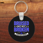 Beschadigde maar niet gebroken ondersteuning voor  sleutelhanger (Voorkant)