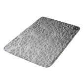 Beschadigde zilvermetalen badmat (Gekanteld)