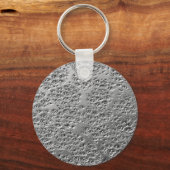 Beschadigde zilvermetalen sleutelhanger (Voorkant)