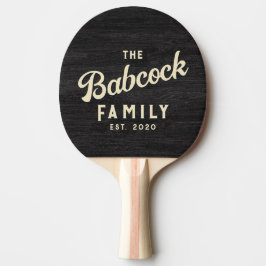 Bescheiden donkere houten retro familienaam en jaa tafeltennisbatje