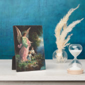 Beschermengel beschermt kinderen bij een richel fotoplaat (Zijkant)