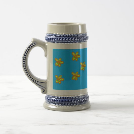 beschilderde bloemen op blauw bierpul (Links)