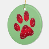 Besneeuwde rode dierpootafdruk keramisch ornament (Links)