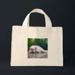 Best cross-eyed cat mini tote bag<br><div class="desc">“The world always looks just a bit out of focus … but I like it that way.”</div>