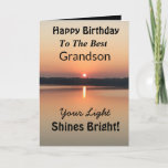 Best Grandson Light Shines Bright Birthday Kaart<br><div class="desc">Geef je kleinzoon je wens voor een gelukkige dag uit op een inspirerend sunset verjaardagskaart met het vers "Your Light Shines Bright". Het minimale ontwerp is modern met gedurfde kleuren van goud en zwart met stromend water en een vreedzaam meer.</div>