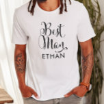 Best Man Black Script Personalized Wedding T-shirt<br><div class="desc">Het shirt Beste man van de weddenschap kenmerkt het moderne zwarte dragende kalligrafiekmanuscript dat met elegante douane voornaam tekst schrijft die u kunt personaliseren. Zie onze coördinerende design van de bruidspartij!</div>