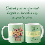 Beste schoondochter ooit gerbera bloemen groen koffiemok<br><div class="desc">Show je schoondochter wat liefde met deze "Best Daughter-in-Law Ever" koffie-mok! Met levendige Gerbera madeliefjes in vrolijke kleuren, is deze mok de perfecte manier om haar ochtenden op te fleuren. Of ze nu koffie, thee of warme cacao drinkt, ze zal eraan herinnerd worden hoe geweldig ze is. Gemaakt van duurzaam...</div>