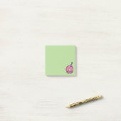Bestrooit het roze suikerglazuur van de Doughnut Post-it® Notes (Op bureau)