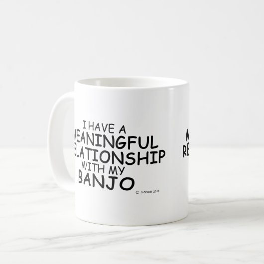Betekenis van de Mok van Banjo Coffee-Relatie (Voorkant links)