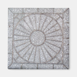 Beton met een zon erin uitgebeiteld magneet