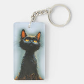 Betoverde zwarte kat sleutelhanger (achterkant)