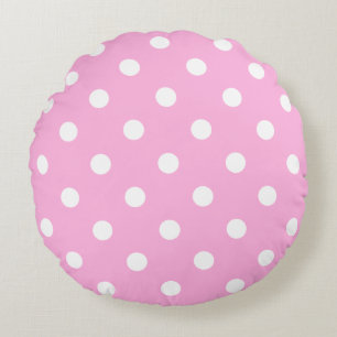 Betoverende pastel lichtroze met grote stippen rond kussen