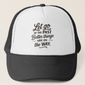 Better Things Trucker Hat — Let Go of the Past Quo Trucker Pet (Voorkant)