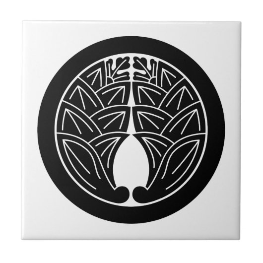 Bevestiging van japanse ingers in cirkel tegeltje (Voorkant)