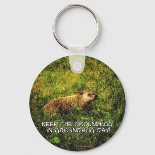 Bewaar de grondhog in de sleutelhanger op de grond