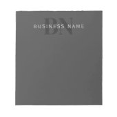 Bewerkbare bedrijfsnaam (of andere tekst) grijs notitieblok (Voorkant)