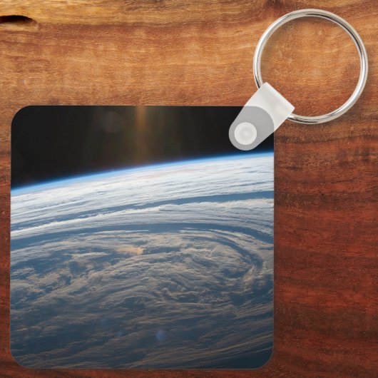 Bewolkte formaties in de Zuid-Indische Oceaan. Sleutelhanger (Achterkant)