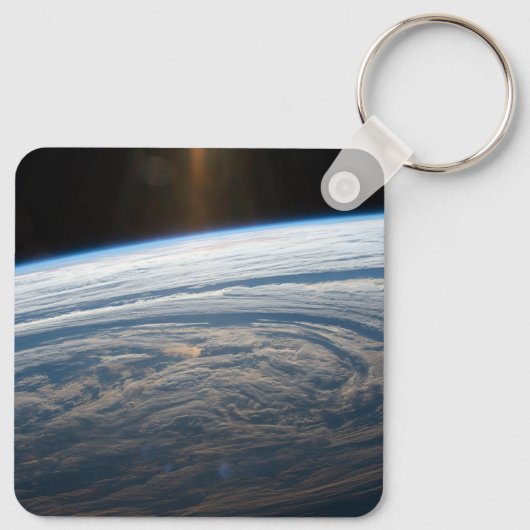 Bewolkte formaties in de Zuid-Indische Oceaan. Sleutelhanger (Achterkant)