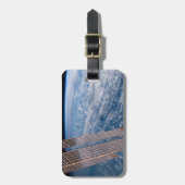 Bewolkte Tasman- en Koraalzee. Bagagelabel (Voorkant verticaal)