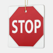 Bezig met stoppen en doorgaan keramisch ornament (Links)