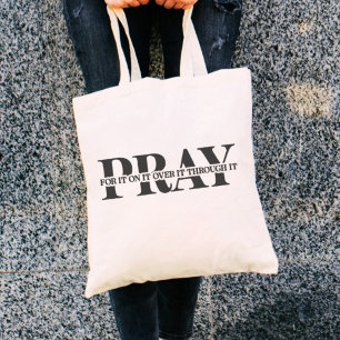 Bid ervoor dat het er doorheen komt tote bag