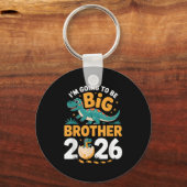 Big Brother 2026 - Dino Zwangerschap Sleutelhanger (Voorkant)