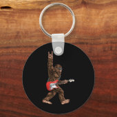 Bigfoot die een elektrische gitaarsteen speelt op  sleutelhanger (Achterkant)