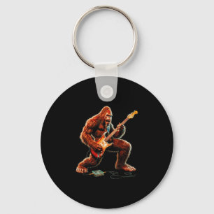 Bigfoot die elektrische gitaar speelt grappige git sleutelhanger