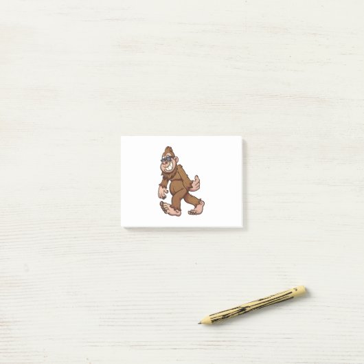 Bigfoot lopen en het dragen van een zonnebril post-it® notes (Op bureau)