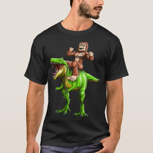 Bigfoot Sasquatch Riding Dinosaur Grappige T-Rex T-shirt (Voorkant)