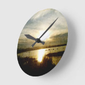 Bij het omlaag gaan van de zon ronde klok (Hoek)