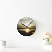 Bij het omlaag gaan van de zon ronde klok (Huis)