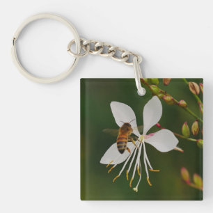 Bijen op de sleutelhanger van de bloem