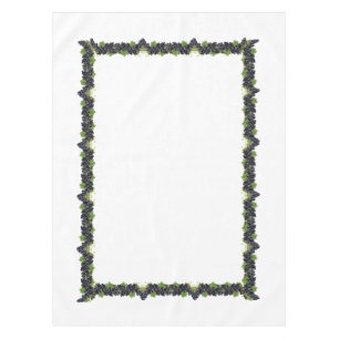 Bijkantoren van rode wijndruiven op witte tablet tafelkleed