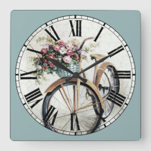 bike met bloemen in mandje vierkante klok