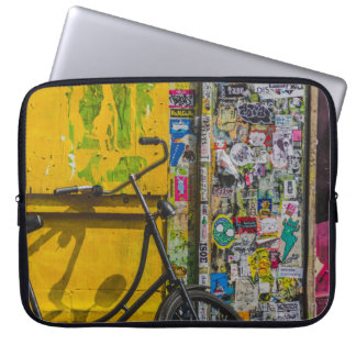 BIKE PARKED BESIDE WALL VOLLEDIG VAN STICKERS LAPTOP SLEEVE