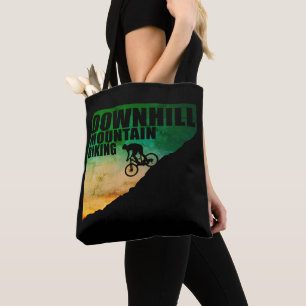 Biking van bergen naar beneden tote bag