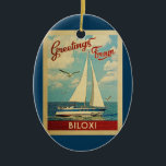 Biloxi Sailboot Vintage Travel Mississippi Keramisch Ornament<br><div class="desc">Deze groeten van de Biloxi Mississippi vintage zijn van nature een boot die op het water zeilt met zeemijlen en een blauwe hemel gevuld met prachtige witte wolken.</div>
