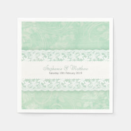 Bindende witte kant op het groenpapier met luiers servet