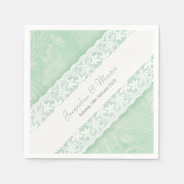 Bindende witte kant op het groenpapier met luiers servet