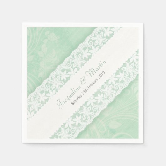 Bindende witte kant op het groenpapier met luiers servet (Voorkant)