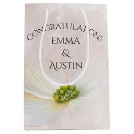 Bindkosmos stroomt op roze medium cadeauzakje