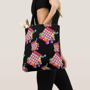 Bingo-kaarten en bingo-ballen op zwart tote bag