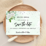 Birthday party floral white elegant save the date<br><div class="desc">Een meisje en trendy sparen de kaart van de Datum voor een 40e (of om het even welke leeftijd) verjaardagspartij. Een stijlvolle witte en groene waterkleurige achtergrond, versierd met faux zilveren glitter sparkles, witte floralen en groen. Pas een datum en een naam/leeftijd aan en voeg deze toe 40 jaar. Zwarte...</div>